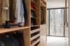Modern home with Storage Room. Custom cabinetry, open walk-in Photo 20 of House in the Woods