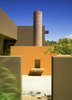 Modern home with Outdoor, Trees, Desert, Shrubs, and Concrete Patio, Porch, Deck. The outdoor fire place is an extension of the luxury kitchen, taking advantage of the clear blue New Mexico skies Photo 13 of Santa Fe Contemporary
