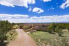 The contemporary High Desert residence is at the end of a cul-de-sac which backs up to a greenbelt offering privacy and stunning views of the Santa Fe mountains. Photo of Santa Fe Contemporary modern home