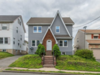 Modern home with Outdoor, Slope, Walkways, and Post Lighting. home front original Photo of watchung home