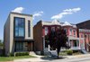 Modern home with Outdoor and Front Yard. Front view of 3 story home in Jackson Ward Historic District Photo of Modern Building Approved in Jackson Ward-Historic district