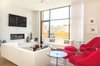 Living room rear of house Photo 7 of Modern Building Approved in Jackson Ward-Historic district modern home