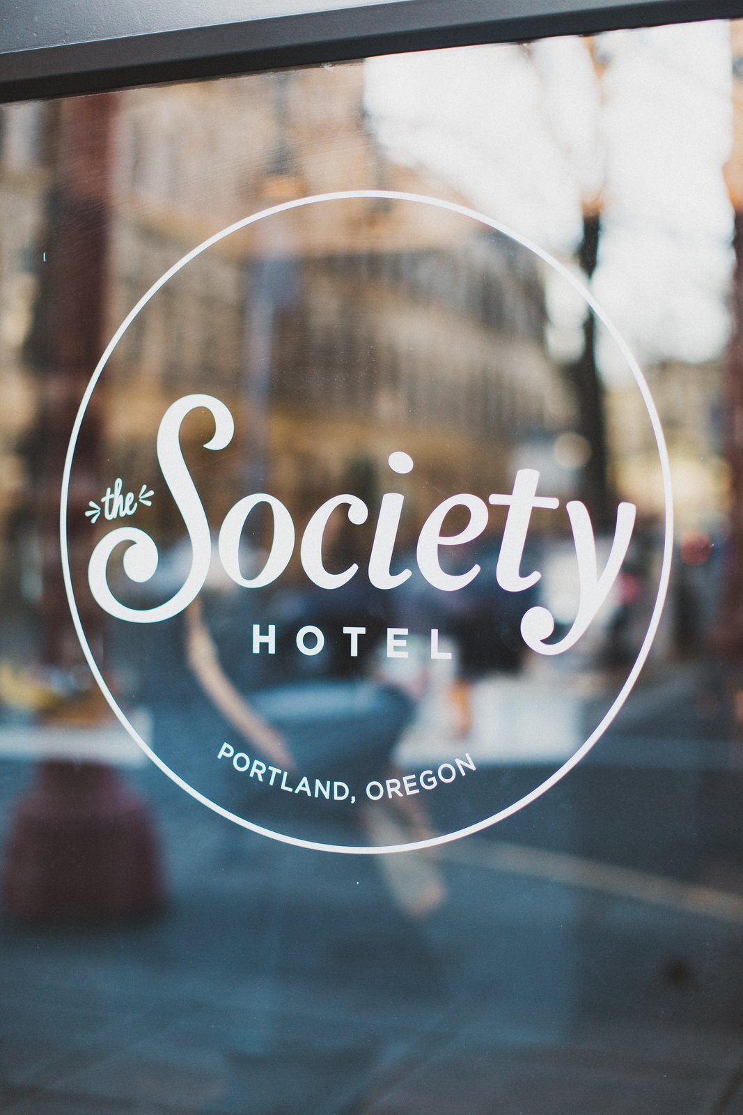 Window graphics provide unobtrusive and elegant signage on the exterior glazing of the historic facade.