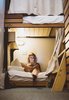Modern home with Bedroom, Bed, Wall Lighting, Bunks, and Carpet Floor. The wood framed bunk beds come complete with a reading light and a privacy curtain. Photo 7 of The Society Hotel