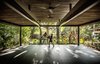 Modern home with Shed & Studio. The yoga studio is surrounded on all sides by the jungle. Light, shadows, and wind pass through the open structure. Photo 10 of Nalu Nosara