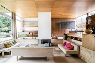 Different shades of brown can bring a masculine feel to living rooms and studies. Choose wood veneers, furniture, or woven textiles in earthy hues to give spaces a grounded feel. Try Behr's Cocoa Shell (HDC-AC-05) or Wright Oak Bark (FLLW623). 