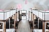 Modern home with Bedroom, Bed, Pendant Lighting, and Light Hardwood Floor. The biggest dorm room sleeps 10, with four up top and six below. The mezzanine sleeping area maintains the cool factor with perforated guards. Photo 6 of Long Story Short Hostel