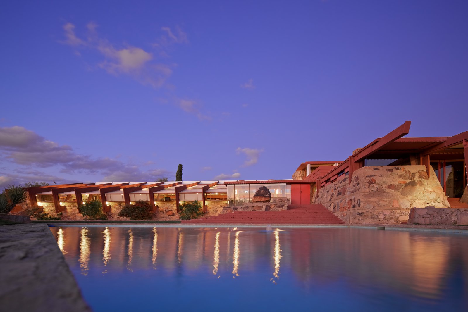 Built in 1937, Taliesin West was an experiment in desert living that evolved at the hands of Wright and his apprentices until he passed in 1959. Meant to be a refuge from the harsh winters of the Midwest, the complex—which grew to include a drafting studio, dining facilities, three theaters, a workshop, Wright’s office and private living quarters, and apprentice and staff residences—takes direct inspiration from the arid landscape. Over the years, Wright continually rethought previous design solutions and rebuilt sections of Taliesin West with the assistance of his apprentices. Today, the complex continues to be the headquarters of the Frank Lloyd Wright Foundation and School of Architecture.