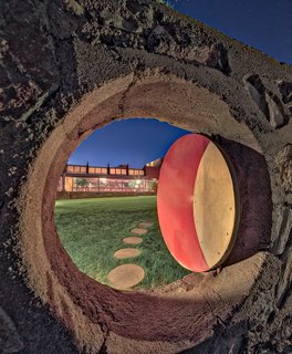 Deeply influenced by Asian culture, art, and design, Wright reflected some of that influence into the design of Taliesin West. Here, the "Moon Gate," a circular opening, displays a hint of the Eastern influence.