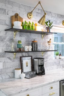 Open shelves provide a location to display decorative accessories.