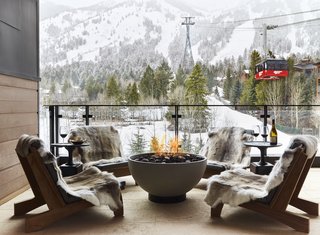 Each suite includes private outdoor balconies complete with fire pits.  Thanks to the snowmelt patios, you can enjoy this view and the great outdoors year round. 