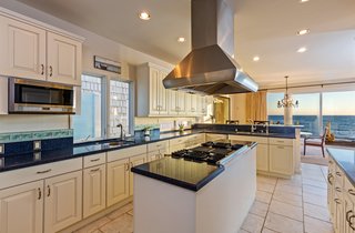 Ocean views can be enjoyed while cooking or entertaining from this chef's kitchen. 