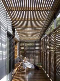 Timber-clad verandas blur the boundaries between indoor and outdoor spaces, while providing protection and filtered light.