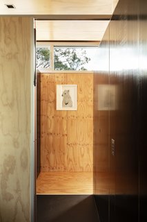 Clerestory windows draw in additional daylight while still providing privacy. 