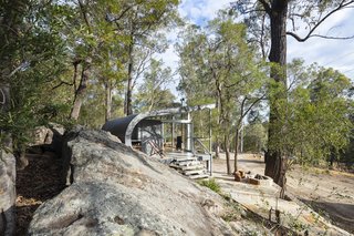 Fabshack is designed to be adaptive to many different site configurations. In this instance, it nestles into a rock outcropping on the architect’s property northwest of Sydney.