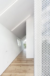 The living quarters are light and bright with a neutral finish palette.