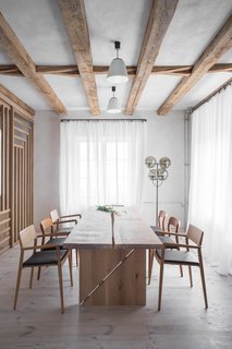 Throughout the home, furniture is mostly made of natural, oiled oak wood.