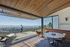 Modern home with Dining Room, Table, Chair, Recessed Lighting, and Medium Hardwood Floor. Rear deck and dining area Photo 4 of Skyline House