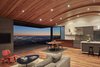 Modern home with Living Room, Chair, Coffee Tables, Stools, Table, Rug Floor, Shelves, Bar, Recessed Lighting, Sectional, and Medium Hardwood Floor. Common space Photo 11 of Skyline House