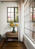 Modern home with Bed, Recessed Lighting, Medium Hardwood Floor, Windows, Casement Window Type, Metal, and Picture Window Type. Steel window detail at bedroom Photo 14 of Boise Residence