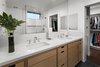 Modern home with Engineered Quartz Counter, Undermount Sink, Enclosed Shower, Recessed Lighting, Subway Tile Wall, Windows, Two Piece Toilet, Awning Window Type, and Metal. Bathroom off walk-in closet Photo 12 of Allaseba Residence
