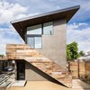 Modern home with Back Yard, Side Yard, Desert, Trees, Hardscapes, Walkways, Wood Patio, Porch, Deck, Small Patio, Porch, Deck, Concrete Patio, Porch, Deck, Decking Patio, Porch, Deck, Decomposed Granite Patio, Porch, Deck, Horizontal Fences, Wall, Hanging Lighting, Pavers Patio, Porch, Deck, Wood Fences, Wall, Sliding Window Type, Picture Window Type, Metal, Wood Railing, and Wood Tread. Access to the art studio is created by an exterior staircase clad in reclaimed wood Photo 2 of Mar Vista Art Studio