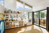 Modern home with Chair, Shelves, Storage, Bookcase, Craft Room Room Type, Desk, Cork Floor, Picture Window Type, Sliding Window Type, Metal, Exterior, Sliding Door Type, Track Lighting, Garage, Detached Garage Room Type, Storage Room Type, Family Room Room Type, Den Room Type, and Sun Room Room Type. Art studio interior Photo 6 of Mar Vista Art Studio