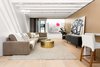 Modern home with Living Room, Stools, Sofa, Console Tables, Coffee Tables, Track Lighting, and Light Hardwood Floor. Living Room towards Entry Photo 6 of Las Casas Residence
