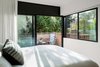 Modern home with Bedroom, Bed, Chair, Night Stands, Lamps, Recessed Lighting, and Light Hardwood Floor. Master Bedroom Photo 15 of Las Casas Residence