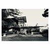 Modern home with Exterior, House Building Type, Mid-Century Building Type, Ranch Building Type, Shingles Roof Material, Metal Roof Material, Wood Siding Material, Stucco Siding Material, and Shed RoofLine. Backyard elevation Photo of Ridgemont Residence