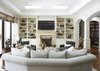 Modern home with Living Room, Chair, Sectional, End Tables, Ottomans, Bookcase, Recessed Lighting, Medium Hardwood Floor, and Gas Burning Fireplace. Great Room Photo 7 of Rustic elegance