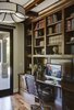 Modern home with Office, Library, Chair, Storage, Desk, Bookcase, Shelves, Lamps, and Medium Hardwood Floor. Library Photo 18 of Rustic elegance