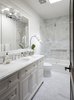 Modern home with Bath Room, Marble Counter, Porcelain Tile Floor, Undermount Sink, Drop In Tub, Enclosed Shower, Recessed Lighting, Wall Lighting, Stone Tile Wall, and One Piece Toilet. Guest Bath Photo 20 of Rustic elegance