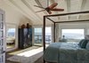 Modern home with Bedroom, Wardrobe, Bench, Bed, Pendant Lighting, and Table Lighting. Master Suite Photo 4 of Stunning Beach House