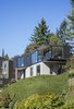 Modern home with Outdoor, Grass, Trees, Shrubs, and Back Yard. Exterior Photo of Canterbury Residence