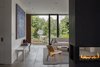 Modern home with Living Room, Concrete Floor, and Two-Sided Fireplace. Helen Street by mw|works Photo 17 of Helen Street