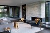 Modern home with Living Room, Chair, Ceiling Lighting, Standard Layout Fireplace, Stools, and Recessed Lighting. Laurelhurst Residence Photo 3 of Laurelhurst Residence