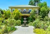 Modern home with Outdoor, Trees, Front Yard, Flowers, Shrubs, Gardens, Walkways, and Large Patio, Porch, Deck. John Viener House - Front Photo of John Viener Home