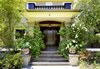 Modern home with Outdoor, Trees, Front Yard, Shrubs, Gardens, Flowers, Stone Patio, Porch, Deck, and Large Patio, Porch, Deck. John Viener House - Entry Photo 2 of John Viener Home