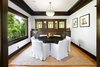 Modern home with Dining Room, Ceiling Lighting, Medium Hardwood Floor, and Shelves. John Viener House - Dining Room Photo 4 of John Viener Home