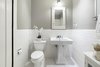 Modern home with Bath Room, Tile Counter, Ceramic Tile Floor, Pedestal Sink, and Ceramic Tile Wall. John Viener House - Bathroom Photo 12 of John Viener Home