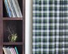 Modern home with Living Room and Bookcase. Plaid draperies invoke the feeling of the early ‘90’s Seattle grunge scene, while providing privacy and light control. Photo 7 of Emerald City Studio