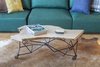 Modern home with Living Room and Coffee Tables. The custom coffee table is topped with a live-edge slab of northwest fir, and has a cool geometric metal base, with casters for easy moving when the bed needs to fold down. Photo 20 of Emerald City Studio