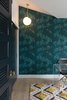 Modern home with Office, Study Room Type, Chair, Desk, and Light Hardwood Floor. A second guest bedroom serves as the office with Hygge & West Wallpaper and IC Flos light designed by Michael Anastassiades.
Photo 6 of 1980s Modern Meets The New Millennium