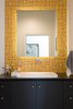 Modern home with Bath Room, Ceramic Tile Floor, Marble Counter, Drop In Sink, Drop In Tub, Enclosed Shower, and Ceiling Lighting. The North bathroom features Rex Rox Studio solar yellow ceramic tile by Modwalls, a custom vanity, marble countertop with knife-edge detail, and Axor Bouroullec faucets. Signature Trustile Doors & Emtek Hardware exemplify the finish detail throughout the property. Photo 9 of 1980s Modern Meets The New Millennium