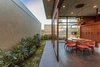 Modern home with Dining Room, Chair, Table, Pendant Lighting, and Ceiling Lighting. Dining area along with the open space. Photo 6 of The Open house