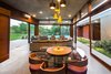 Modern home with Dining Room, Table, Ceiling Lighting, Chair, and Pendant Lighting. Connected dining and living areas. Photo 11 of The Open house