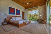 Modern home with Bedroom, Bed, Ceiling Lighting, and Ceramic Tile Floor. Master bedroom Photo 12 of Pacific Breeze house overlooking the Ocean