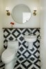 Modern home with Bath Room, Cement Tile Floor, One Piece Toilet, and Wall Mount Sink. Powder room with Ann Sacks cement tile wrapping the wall. Photo 13 of Mt. Tabor