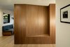 Modern home with Storage Room and Cabinet Storage Type. Walnut slat wall and bench at back entry. Photo 10 of Mt. Tabor